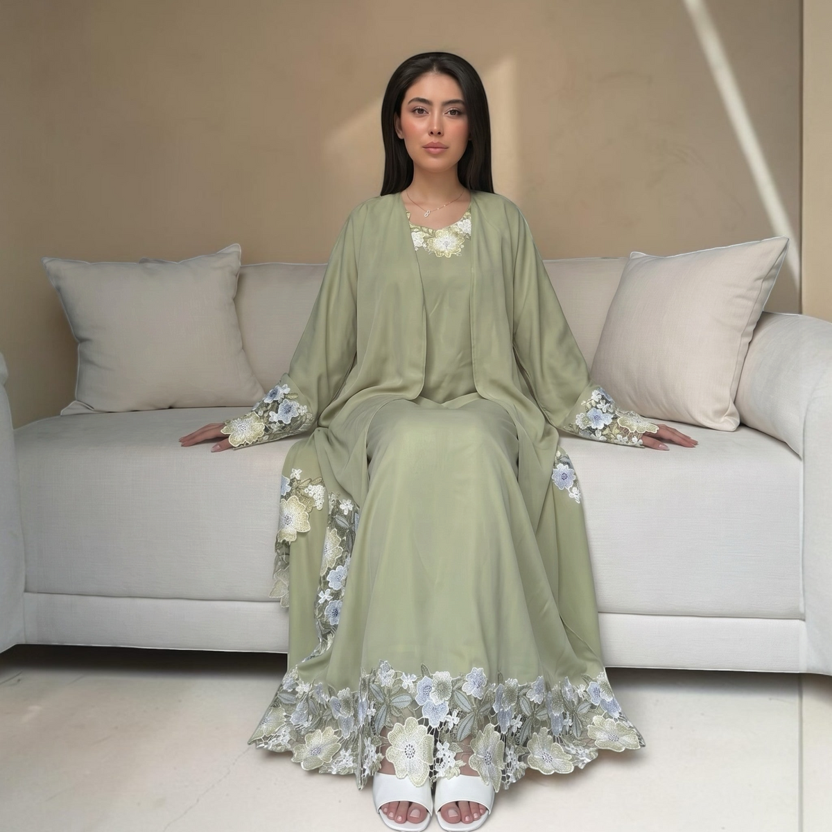 AbayasSh green Nida fabric abaya with floral lace detailing on sleeves and hem, includes inner dress.