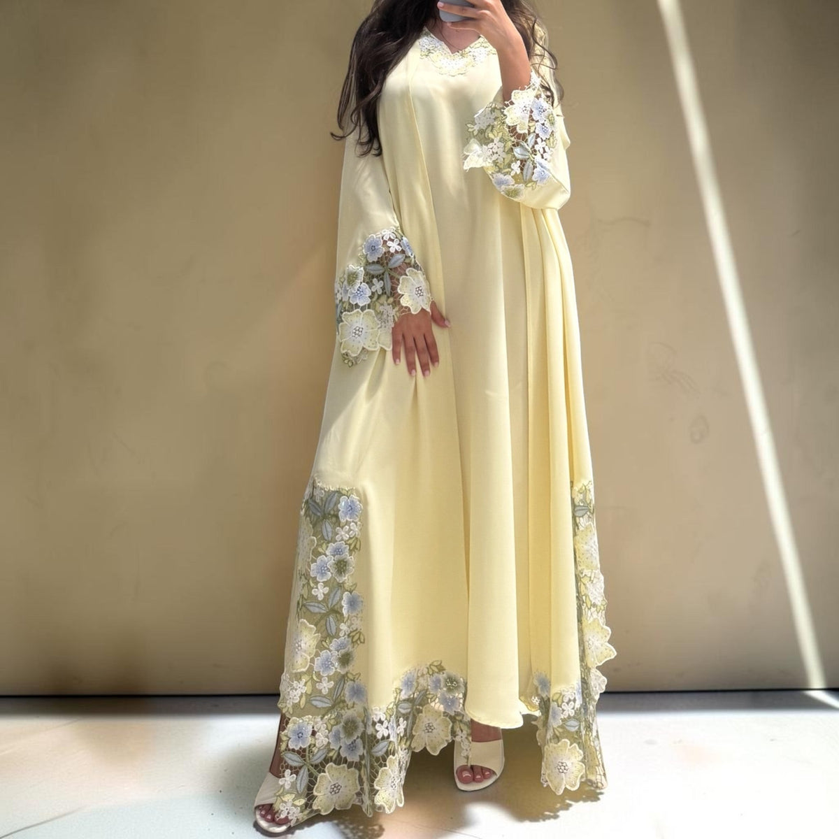 ABAYAS yellow Nida abaya with floral lace on sleeves and hem, open front, matching inner dress.